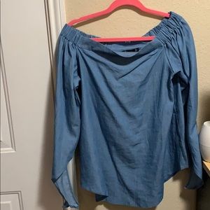 Off the shoulder blue jean shirt